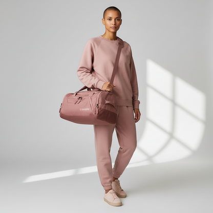 KOFFER-PLUS.COM Travelite Kick Off S rose pink polyester travel bag, 40cm, with shoulder strap and handles.